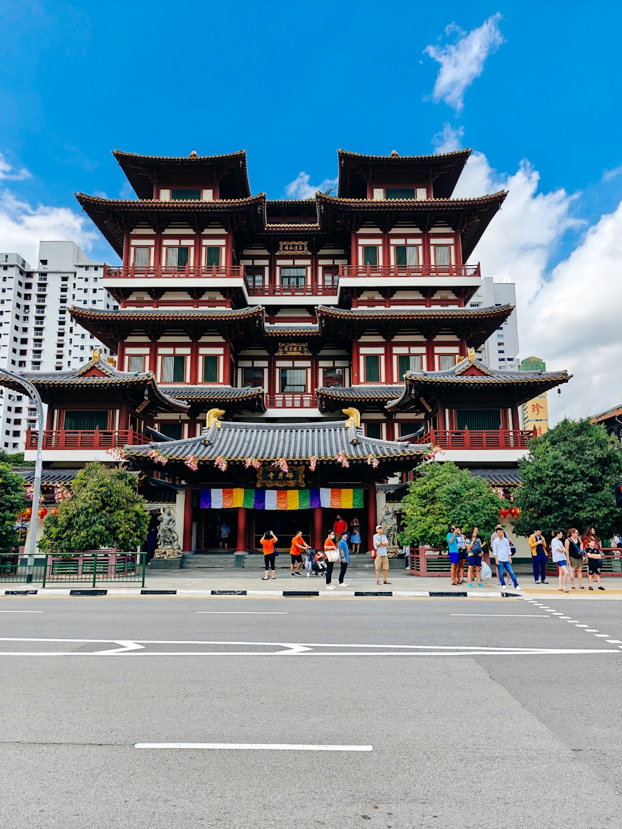 A traditional temple sits under a bright blue sky.